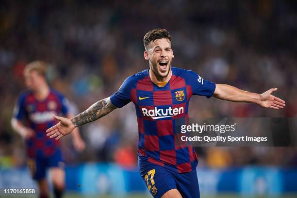 Carles Perez of FC Barcelona celebrates scoring his team's third goal during the Liga match between FC Barcelona and Real Betis Balompie at Camp Nou...
