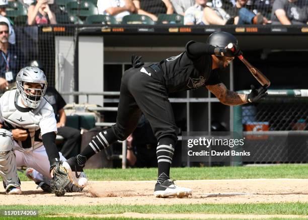 Leury Garcia of the Chicago White Sox is hit by a pitch against the Texas Rangers during the seventh inning at Guaranteed Rate Field on August 25,...