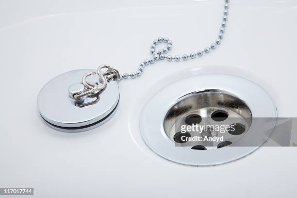 bath plug - sink plug stock pictures, royalty-free photos & images