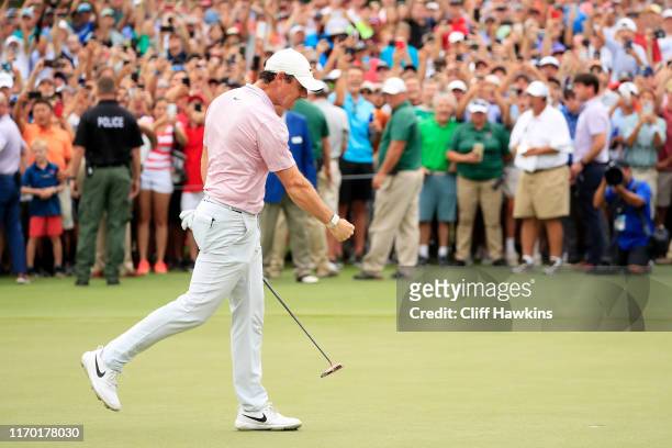 Rory McIlroy of Northern Ireland celebrates after winning on the 18th green during the final round of the TOUR Championship at East Lake Golf Club on...