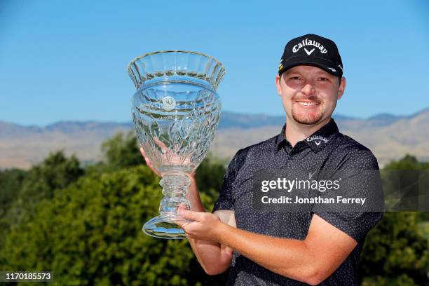 Matthew NeSmith poses with the trophy on the 18th hole during the final round of the Korn Ferry Tour Albertson's Boise Open at Hillcrest Country Club...