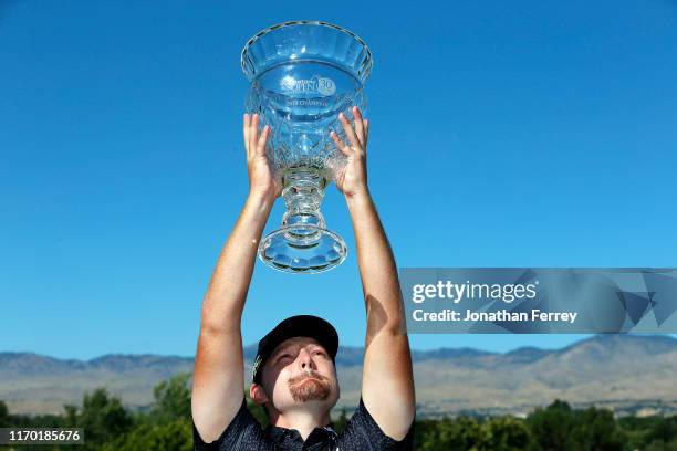 Matthew NeSmith poses with the trophy on the 18th hole during the final round of the Korn Ferry Tour Albertson's Boise Open at Hillcrest Country Club...