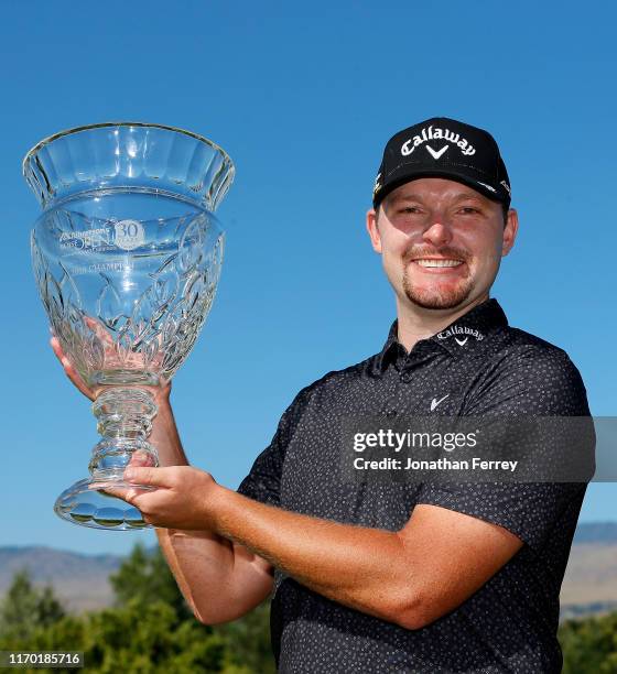 Matthew NeSmith poses with the trophy on the 18th hole during the final round of the Korn Ferry Tour Albertson's Boise Open at Hillcrest Country Club...