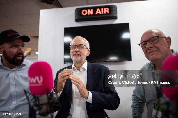 Jeremy Corbyn with Chris Webb, Director of Communications for the Communication Workers Union, and Dave Ward, General Secretary for the CWU, during a...