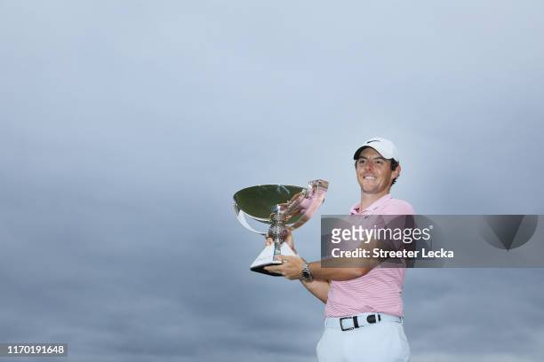Rory McIlroy of Northern Ireland celebrates with the FedExCup trophy after winning during the final round of the TOUR Championship at East Lake Golf...