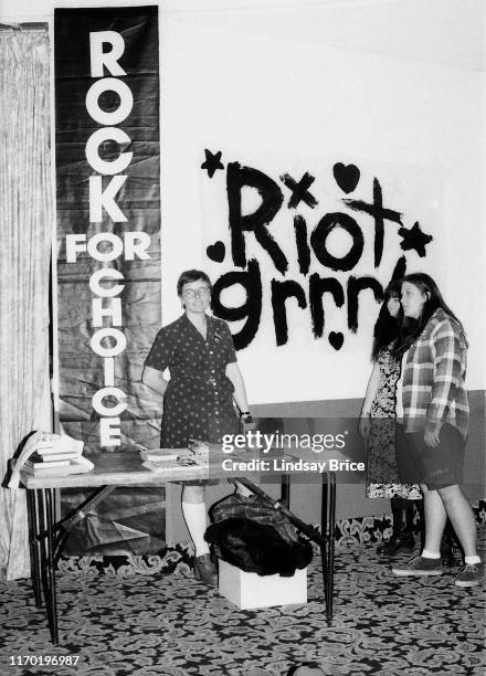 Volunteers offer reproductive health information and riot grrrl zines to concert-goers at tables in the lobby of the Hollywood Palladium during Rock...
