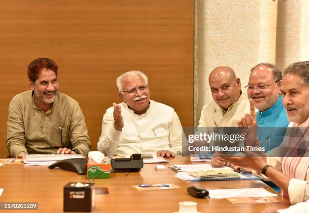 Chief Minister of Haryana Manohar Lal Khattar and Haryana state BJP President Subhash Barala with others during the State Assembly Election Core...