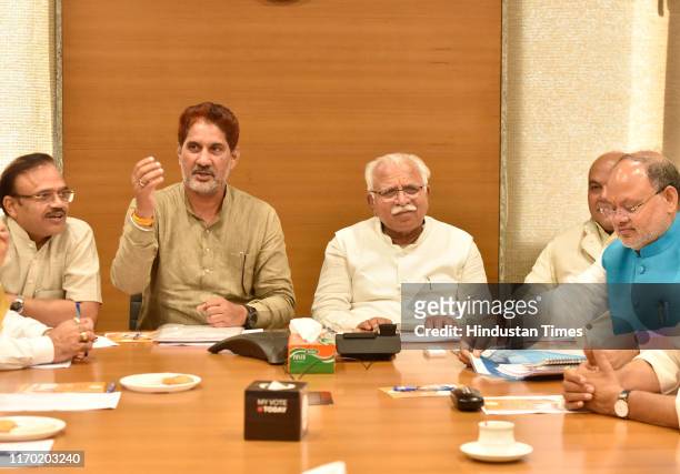 Chief Minister of Haryana Manohar Lal Khattar and Haryana state BJP President Subhash Barala with others during the State Assembly Election Core...