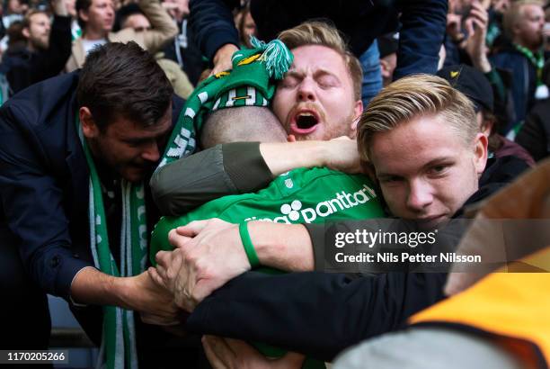 Vladimir Rodic of Hammarby IF celebrates with fans after scoring to 2-0 during the Allsvenskan match between Hammarby IF and AIK at Tele2 Arena on...