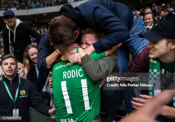 Vladimir Rodic of Hammarby IF celebrates with fans after scoring to 2-0 during the Allsvenskan match between Hammarby IF and AIK at Tele2 Arena on...
