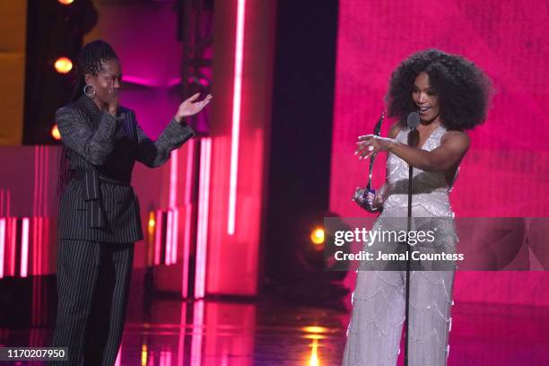 Regina King and Angela Bassett speak onstage at Black Girls Rock 2019 Hosted By Niecy Nash at NJPAC on August 25, 2019 in Newark, New Jersey.