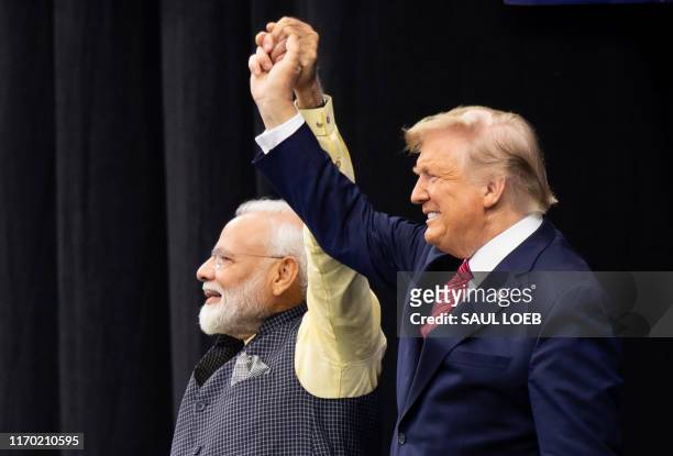 President Donald Trump and Indian Prime Minister Narendra Modi attend "Howdy, Modi!" at NRG Stadium in Houston, Texas, September 22, 2019. - Tens of...