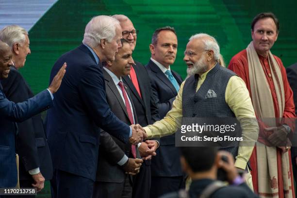 Indian Prime Minster Narendra Modi is greeted by U.S. Sen. John Coryn onstage at NRG Stadium during a rally on September 22, 2019 in Houston, Texas....