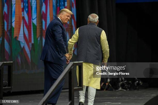 Indian Prime Minster Narendra Modi and U.S. President Donald Trump walk onstage at NRG Stadium during a rally on September 22, 2019 in Houston,...