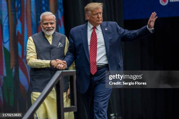 Indian Prime Minster Narendra Modi and U.S. President Donald Trump leave the stage at NRG Stadium after a rally on September 22, 2019 in Houston,...