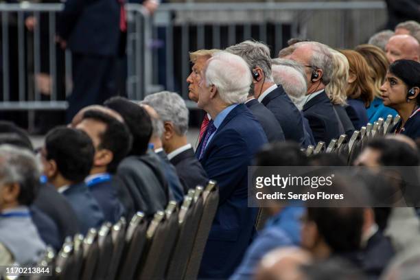 President Donald Trump looks on as Indian Prime Minster Narendra Modi speaks at a rally at NRG Stadium on September 22, 2019 in Houston, Texas. The...
