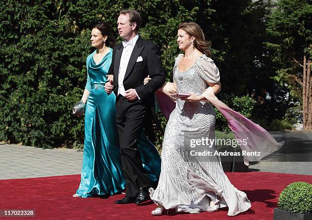 Gustav Prince of Sayn-Wittgenstein-Berleburg with Carina Axelsson and Princess Alexia of Greece arrive fot the wedding of Princess Nathalie zu...