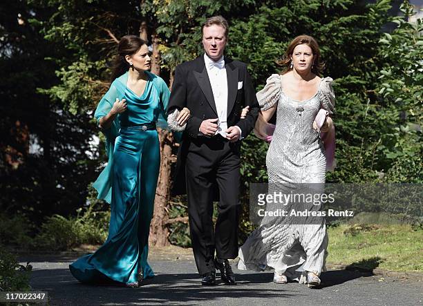 Gustav Prince of Sayn-Wittgenstein-Berleburg with Carina Axelsson and Princess Alexia of Greece arrive fot the wedding of Princess Nathalie zu...