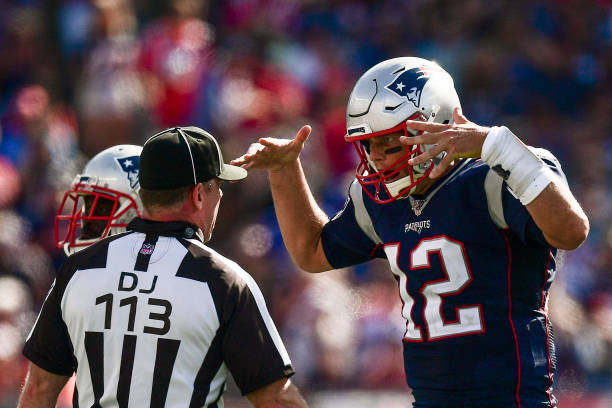 Tom Brady of the New England Patriots argues with the referee during the third quarter of a game against the New York Jets at Gillette Stadium on...