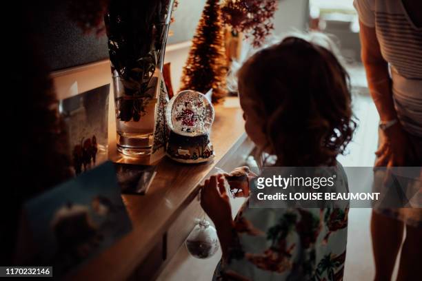 christmas with granny - snow globe stock-fotos und bilder