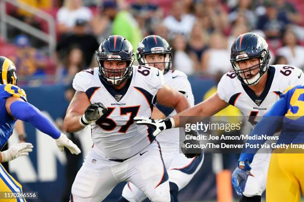 Denver Broncos offensive guard Don Barclay and offensive tackle Jake Rodgers guarding quarterback Kevin Hogan as the Denver Broncos take on the Los...