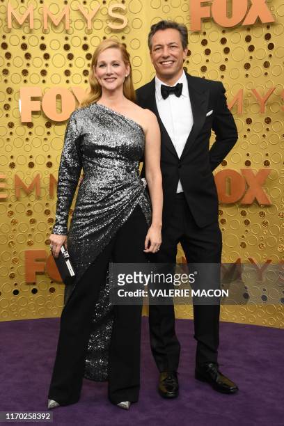 Actress Laura Linney and husband Marc Schauer arrive for the 71st Emmy Awards at the Microsoft Theatre in Los Angeles on September 22, 2019.