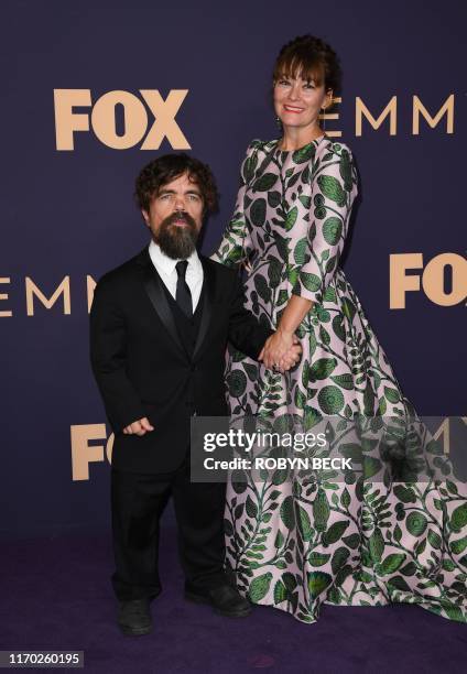 Actor Peter Dinklage and his wife Erica Schmidt arrive for the 71st Emmy Awards at the Microsoft Theatre in Los Angeles on September 22, 2019.