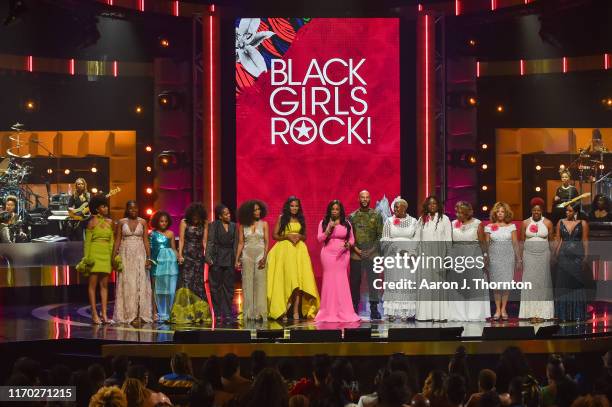Performers and Honorees onstage, including Debra Chase Martin, Regina King, Angela Bassett, Beverly Bond, Niecy Nash and Common at NJ Performing Arts...