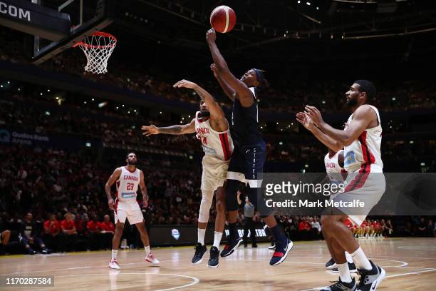 Khem Birch of Canada and Myles Turner of the USA compete for the ball during the International Friendly Basketball match between Canada and the USA...