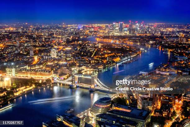 london aerial view with tower bridge, uk - london night stock pictures, royalty-free photos & images