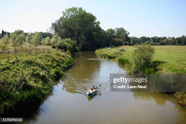 People escape from the heat by kayaking on the River Medway as record temperatures are recorded elsewhere in England on August 26, 2019 in Tonbridge,...