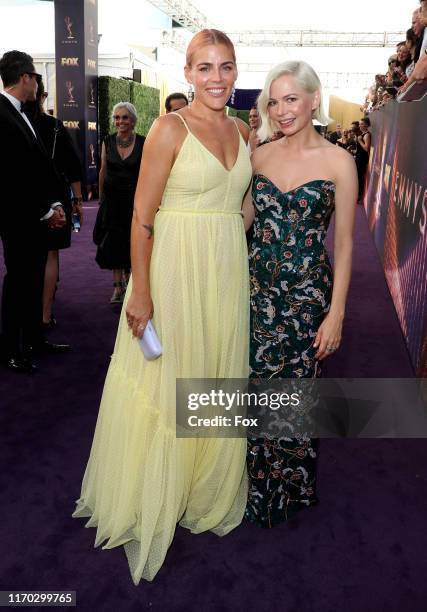 Busy Philipps and Michelle Williams attend FOXS LIVE EMMY RED CARPET ARRIVALS during the 71ST PRIMETIME EMMY AWARDS airing live from the Microsoft...