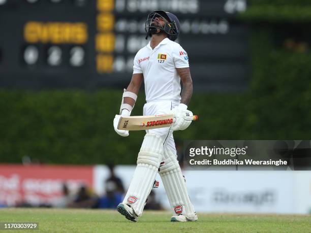 Niroshan Dickwella of Sri Lanka looks dejected after being dismissal as leave the pitch during the day five of the Second Test match between Sri...