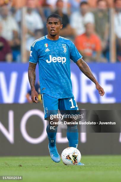 Juventus player Douglas Costa during the Serie A match between Parma Calcio and Juventus at Stadio Ennio Tardini on August 24, 2019 in Parma, Italy.