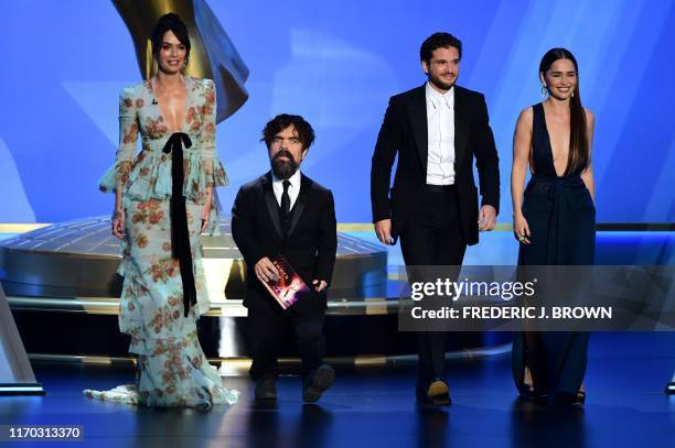 Lena Headey, Peter Dinklage, Kit Harington and Emilia Clarke walk onstage during the 71st Emmy Awards at the Microsoft Theatre in Los Angeles on...