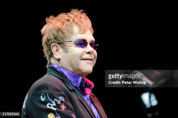 Elton John performs on stage at the Lanxess-Arena on June 19, 2011 in Cologne, Germany.
