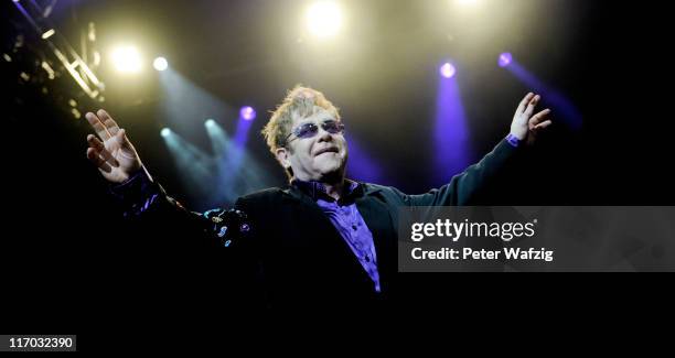 Elton John performs on stage at the Lanxess-Arena on June 19, 2011 in Cologne, Germany.