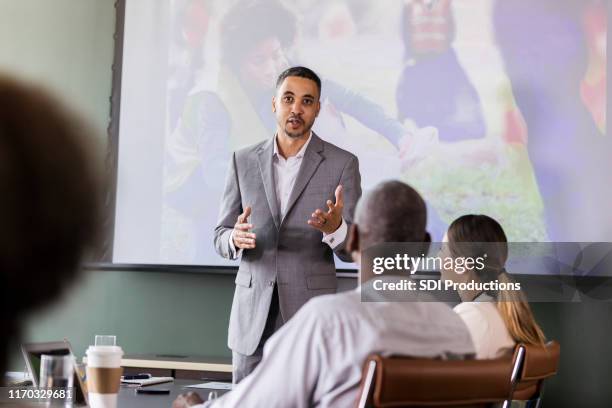 businessman discussing corporate sponsorship opportunities - event sponsor stock pictures, royalty-free photos & images