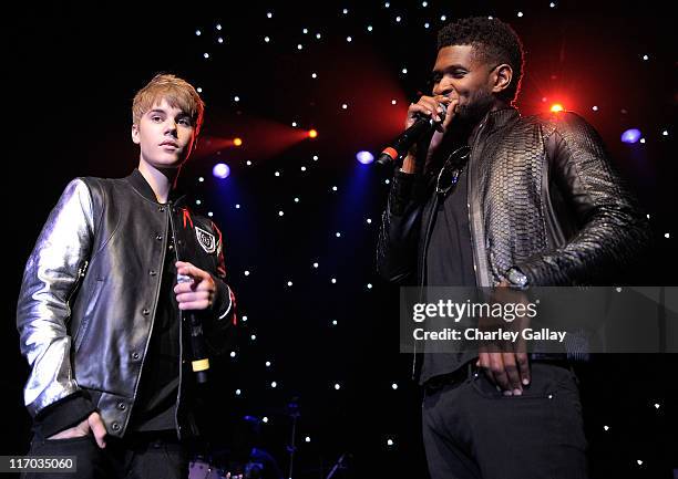 Musicians Justin Bieber and Usher perform at Scott 'Scooter' Braun's 30th Birthday Party at the Music Box Theater on June 18, 2011 in Hollywood,...