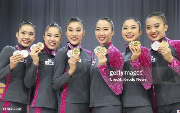 Members of the Japan women's rhythmic gymnastics team -- Kiko Yokota, Ayuka Suzuki, Rie Matsubara, Sayuri Sugimoto, Nanami Takenaka and Sakura...