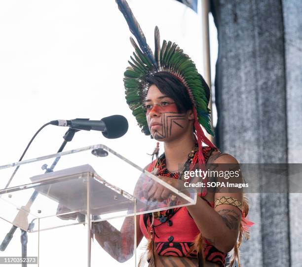 Brazil Indigenous activist, Artemisa Xakriaba speaks on stage during NYC Climate Strike rally and demonstration at Battery Park.