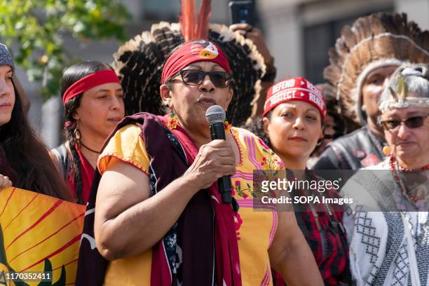 Indigenous people from Brazil and Puerto Rico on stage during NYC Climate Strike rally and demonstration at Foley Square.