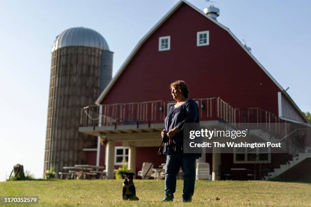 Lisa Kremer, project coordinator with Familias Juntas stands in front of the historic barn on her familys land in Iona, Minn., September 4, 2019. The...