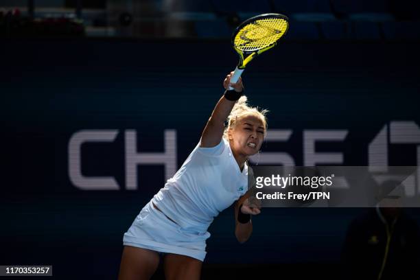 Zarina Diyas of Kazakhstan serves against Ashleigh Barty of Australia on Arthur Ashe Stadium in the first round of the US Open at the USTA Billie...