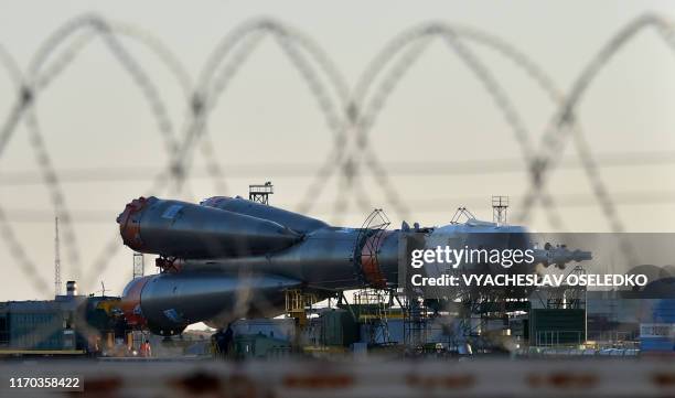 The Soyuz booster rocket FG with Soyuz MS-15 spacecraft is transported to the launch pad at the Russian-leased Baikonur cosmodrome in Kazakhstan on...