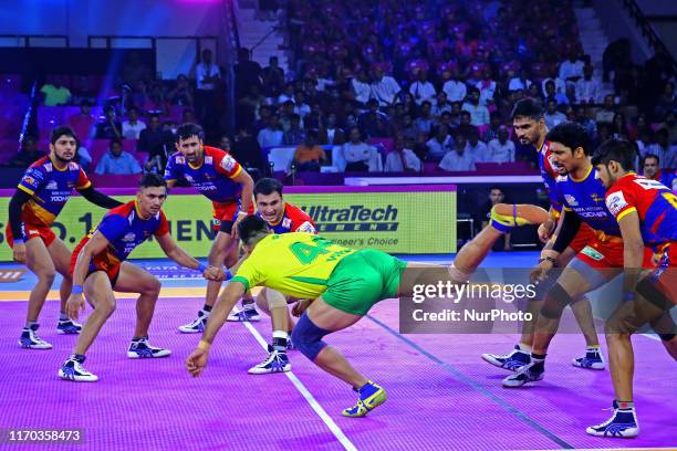 Players of UP Yodhas and Tamil Thalaivas in action during the Pro Kabaddi League match at SMS Indoor Stadium in Jaipur,Rajasthan, India Saturday,...