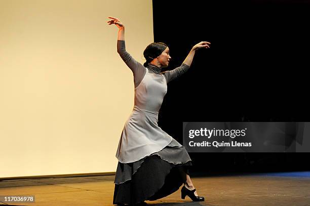 Spanish dancer Olga Pericet performs during the dress rehearsal of the flamenco show 'Bailes alegres para personas tristes' on stage at the Teatros...