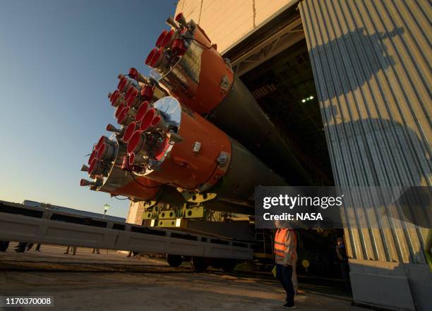 The Soyuz rocket is rolled out by train to the launch pad, September 23, 2019 at the Baikonur Cosmodrome in Kazakhstan. Expedition 61 crewmembers...