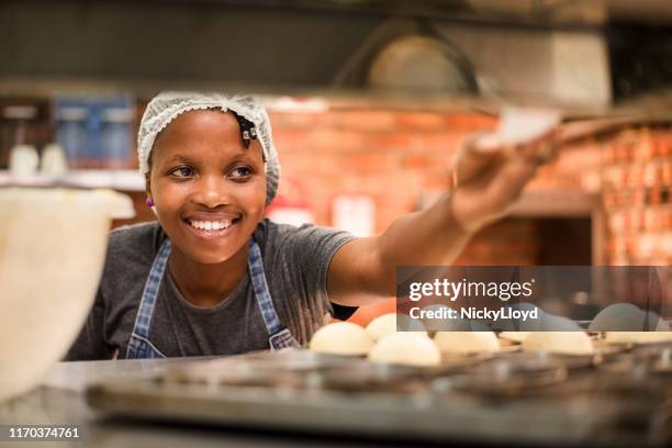 checking the order at the restaurant kitchen - black chef stock pictures, royalty-free photos & images