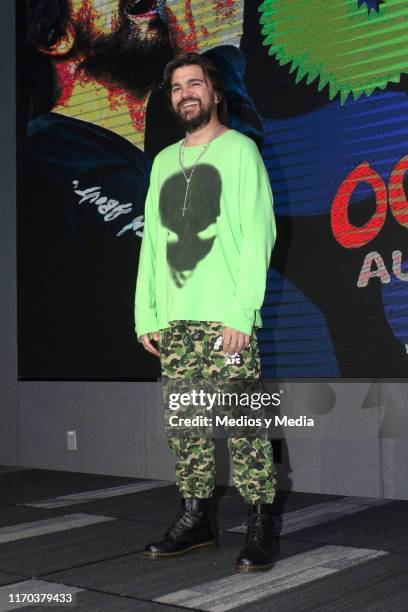 Juanes poses for photos during a press conference for Colombian singer-songwriter Juanes at Universal Music on August 26, 2019 in Mexico City, Mexico.